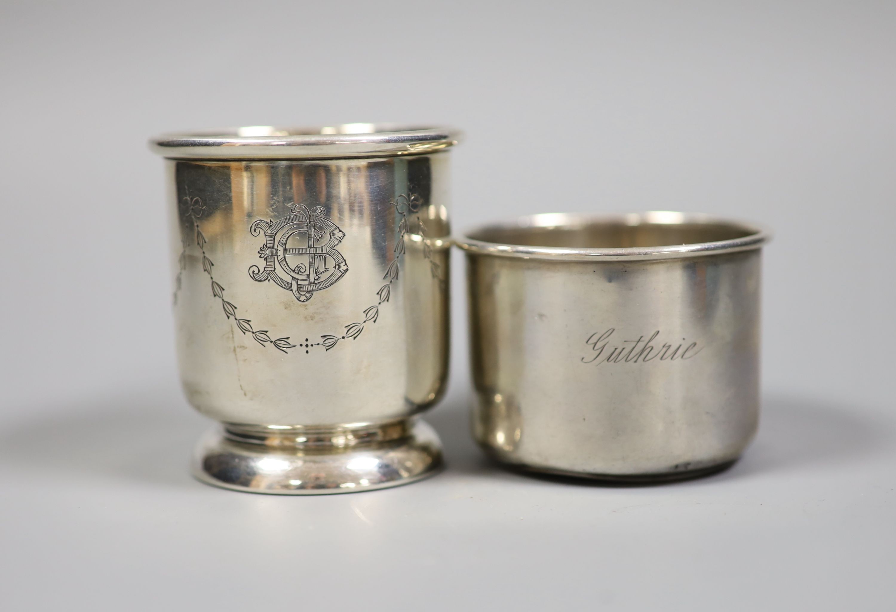 Mixed silver and sterling items including two mugs, two sauce ladles, salt thimble, nut dish and two silver handled implements